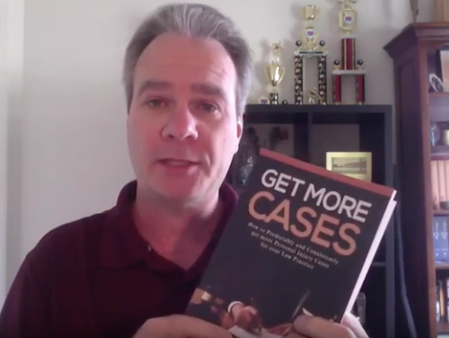 Ed Akehurst with Get More Cases Book